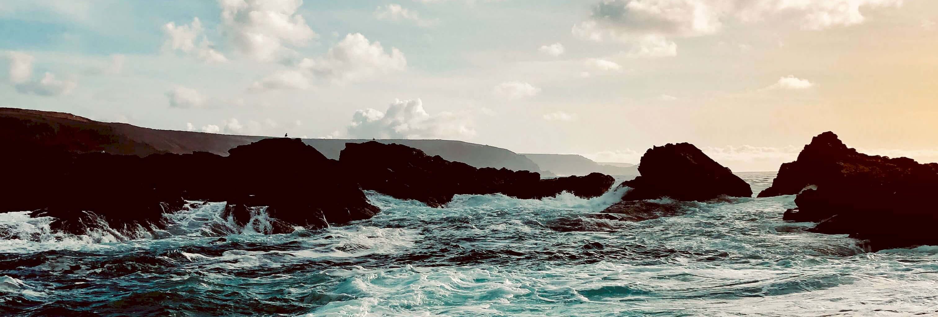 Sea crashing into rocks