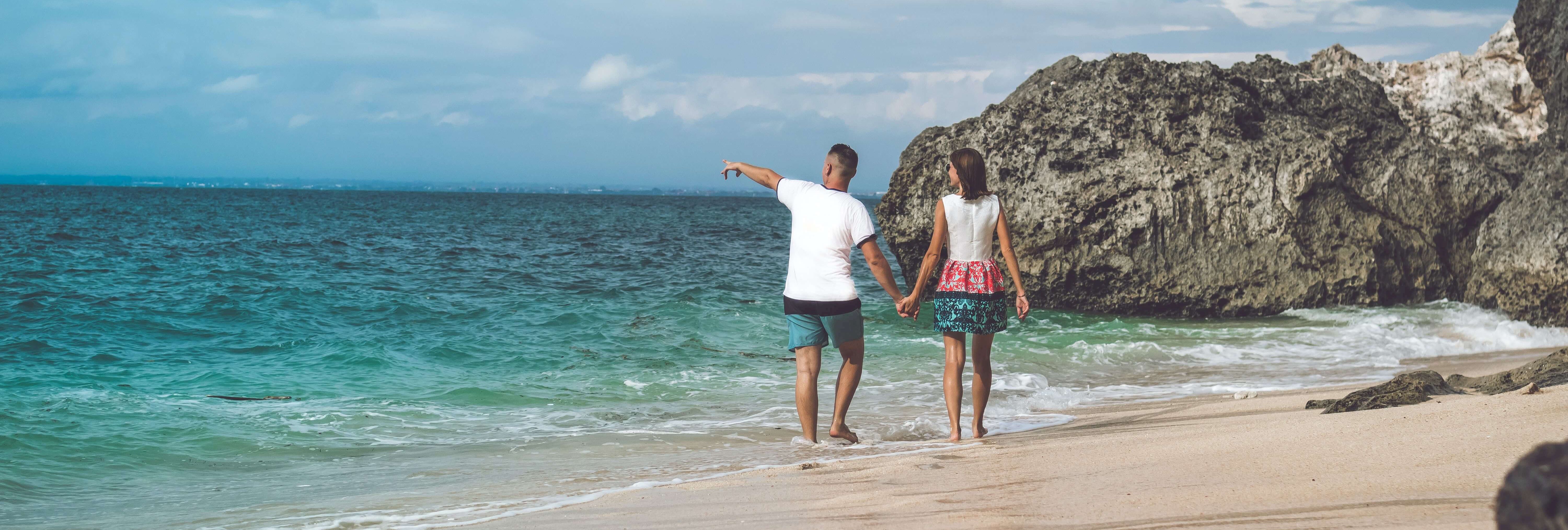 Couple walking on beach