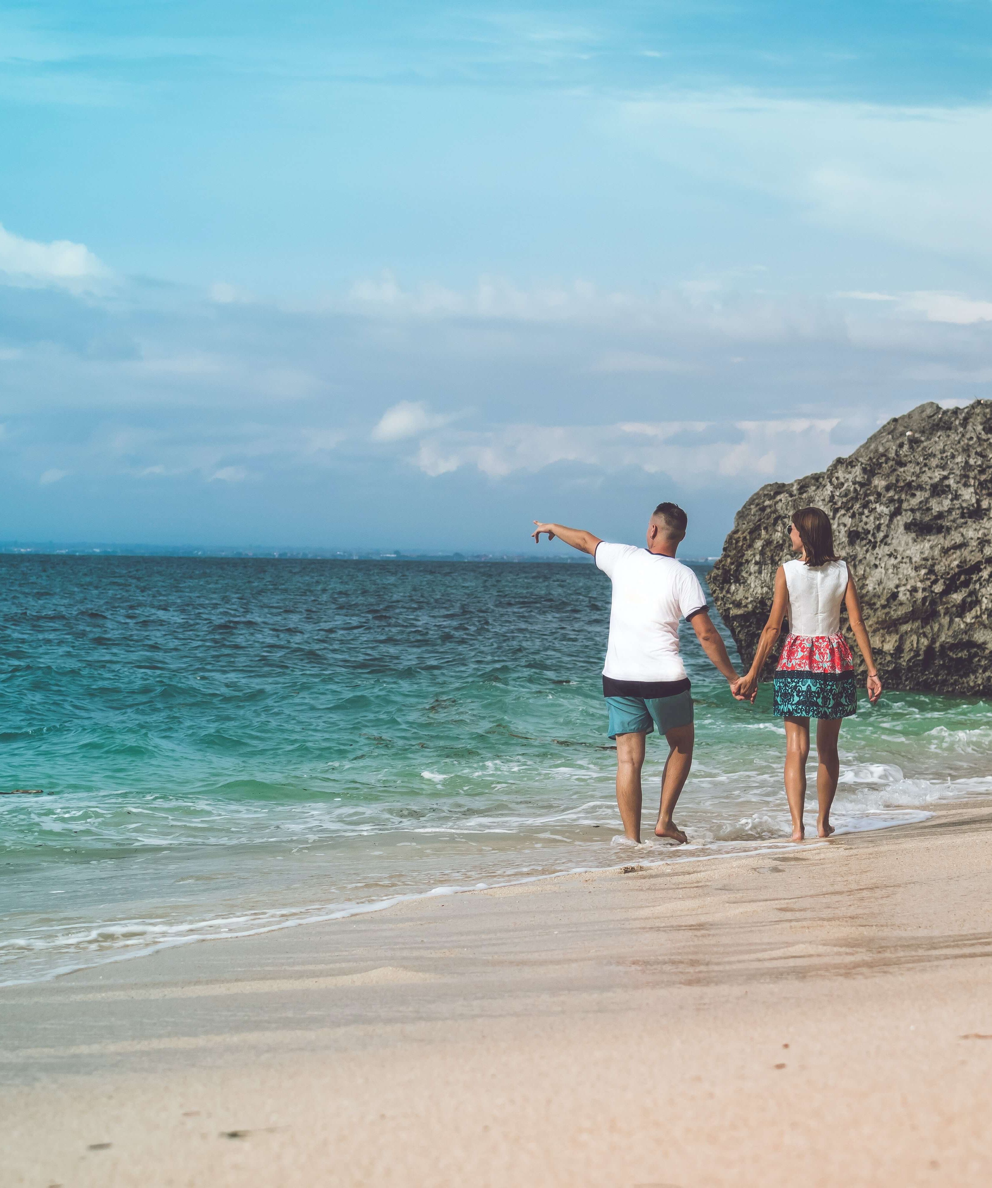 Couple walking on beach