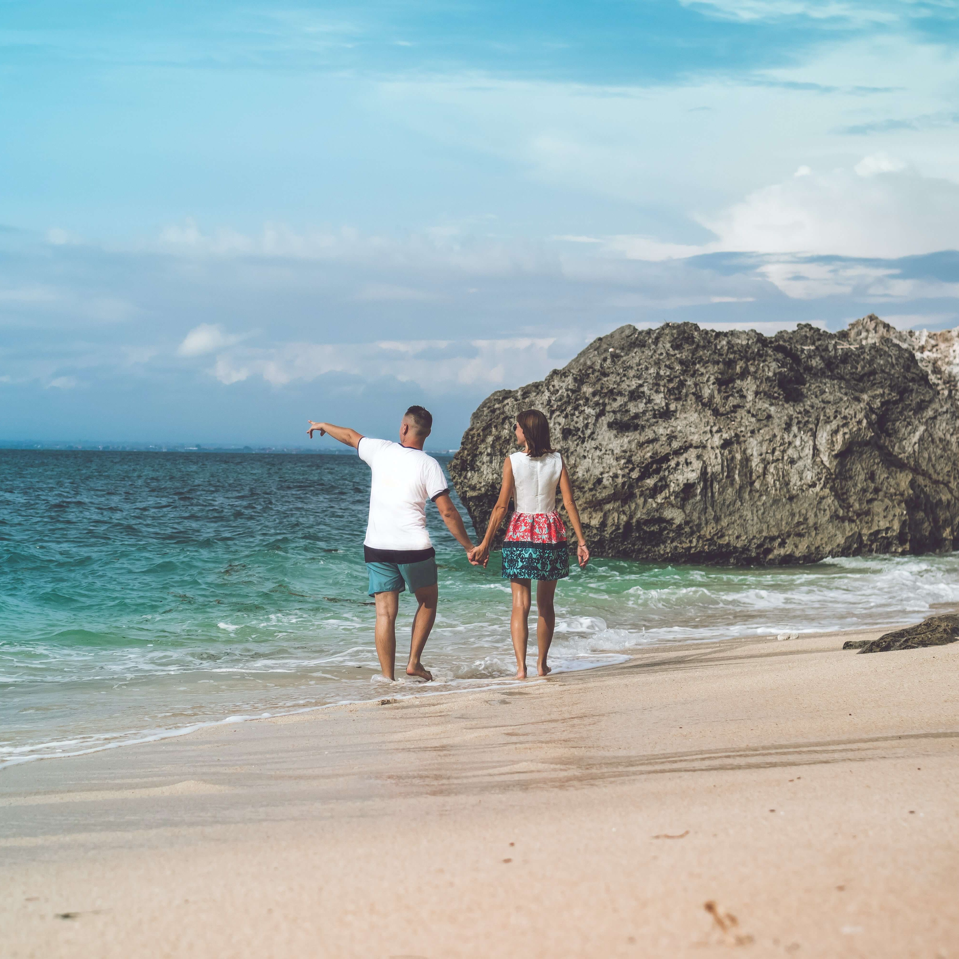 Couple walking on beach