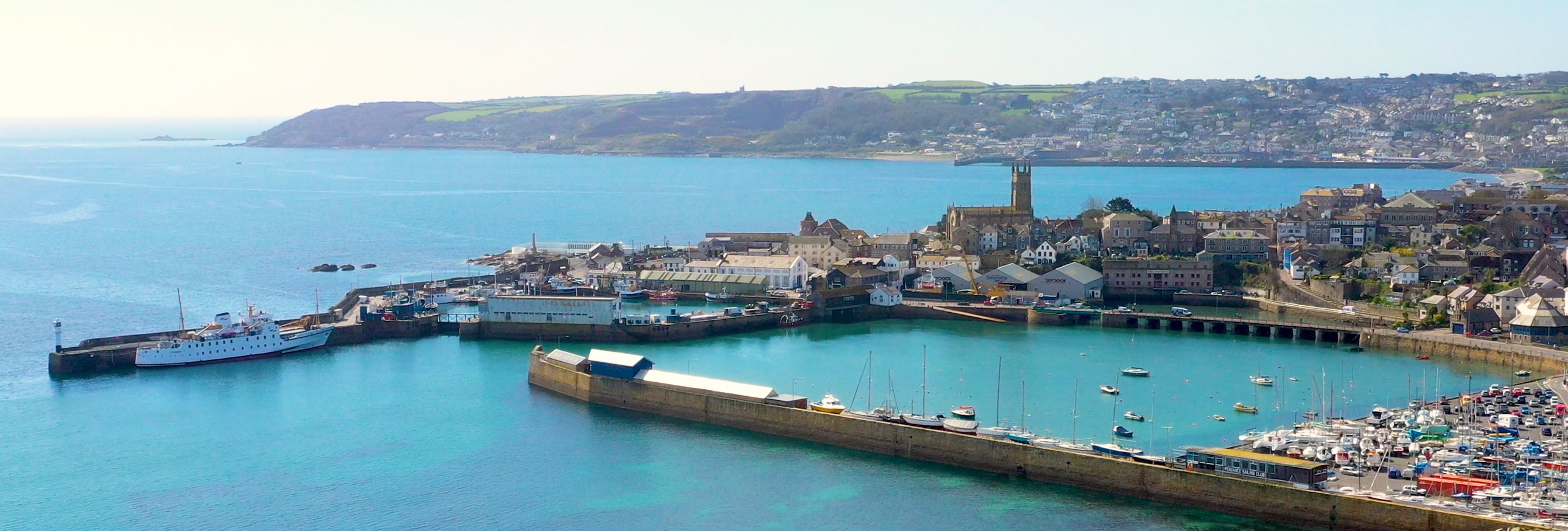 Hotel Penzance harbour with blue waters