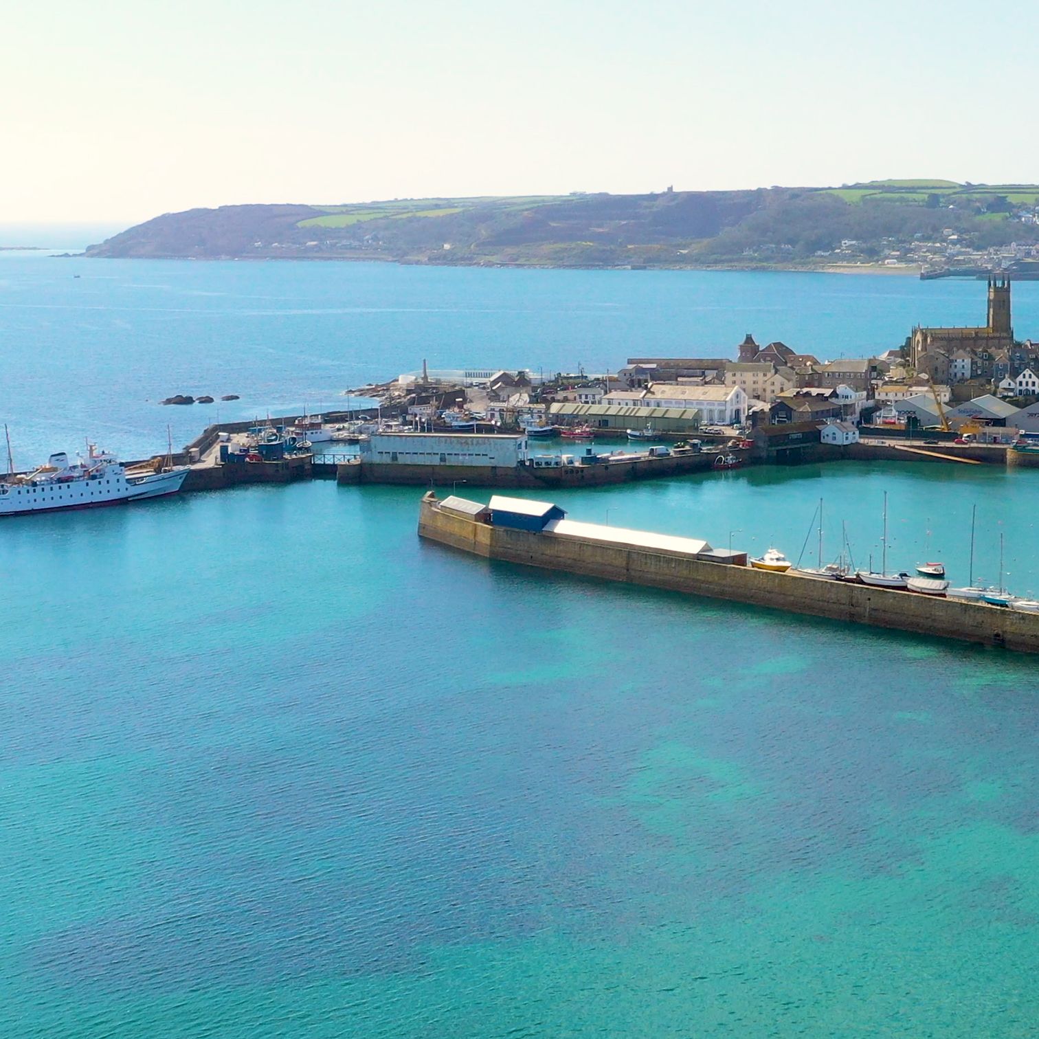 Hotel Penzance harbour with blue waters