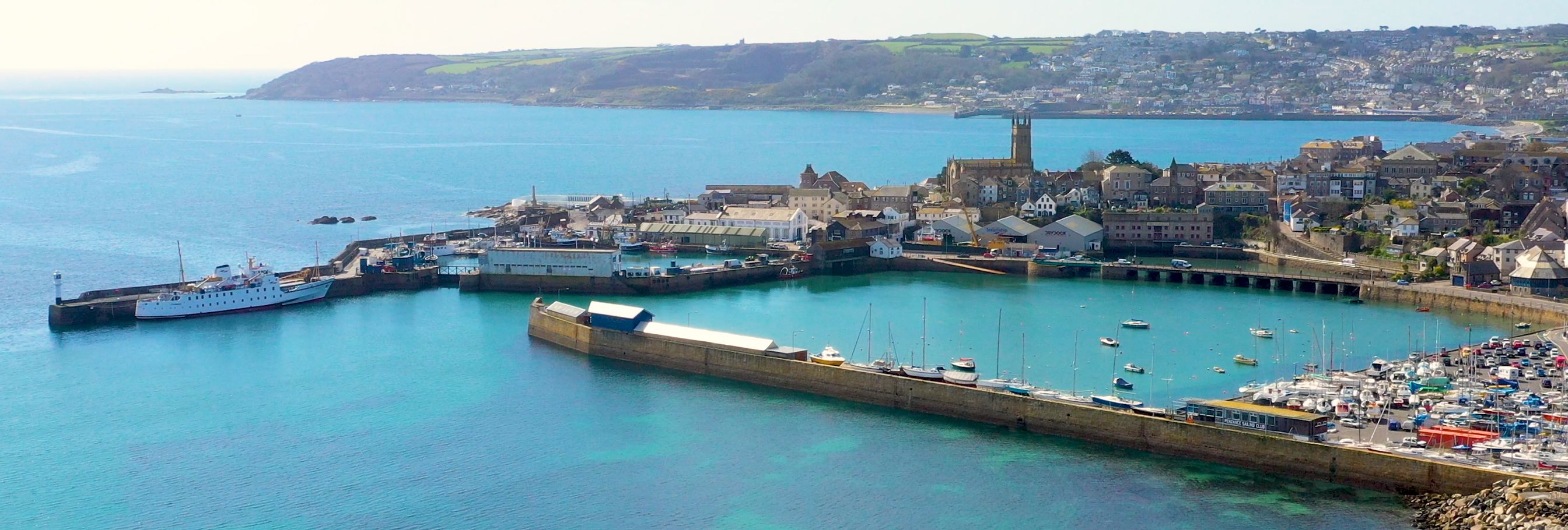 Hotel Penzance harbour with blue waters