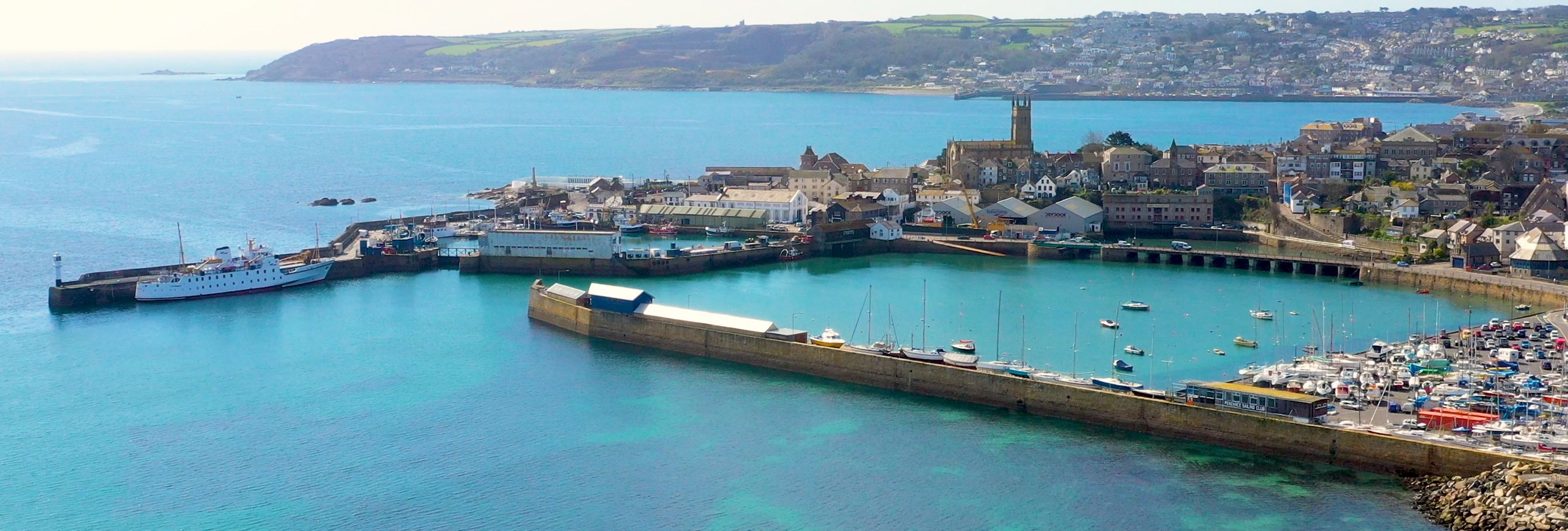 Hotel Penzance harbour with blue waters