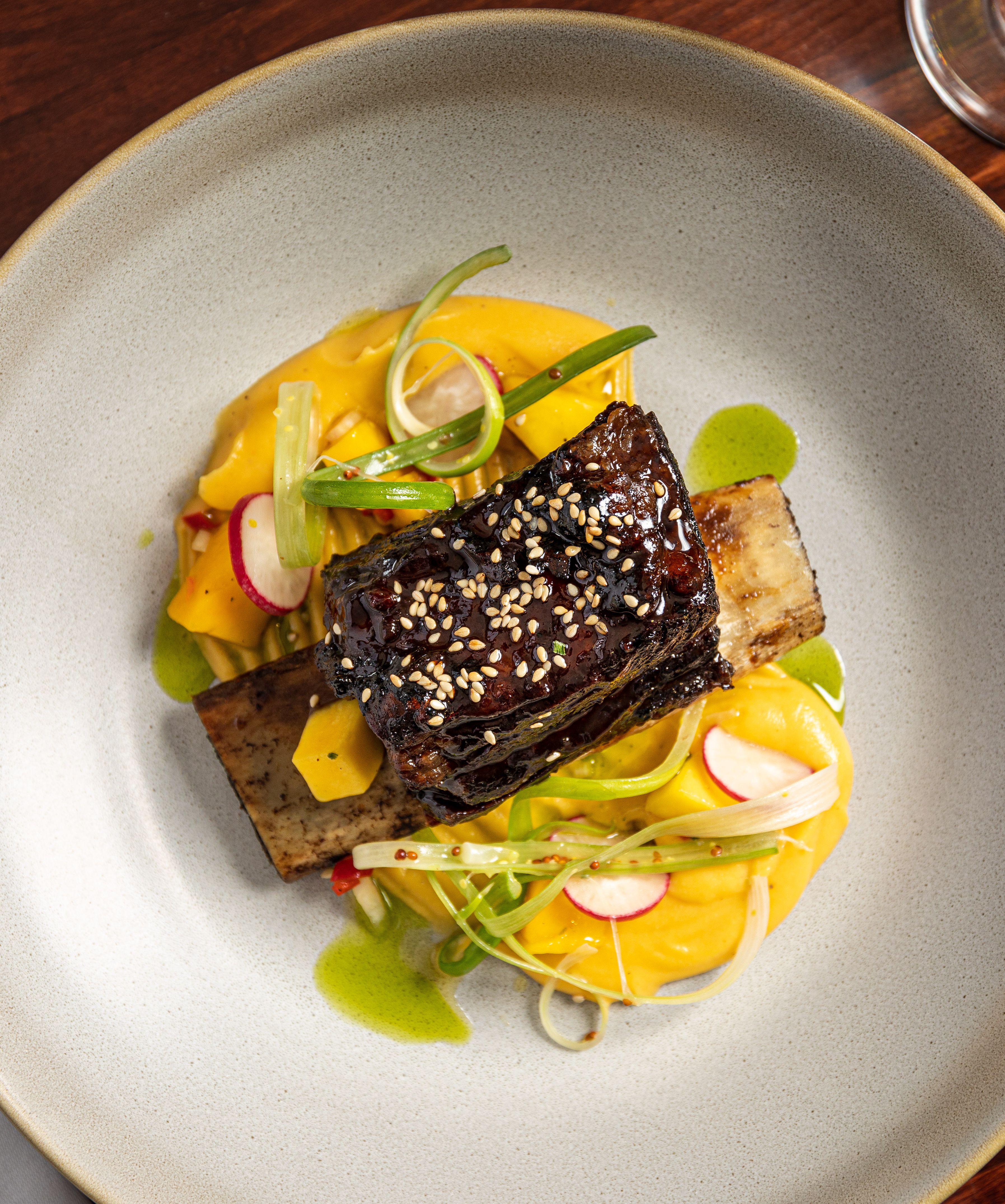 Hoisin Glazed Rib of Beef, spiced squash puree, mango salsa, fried