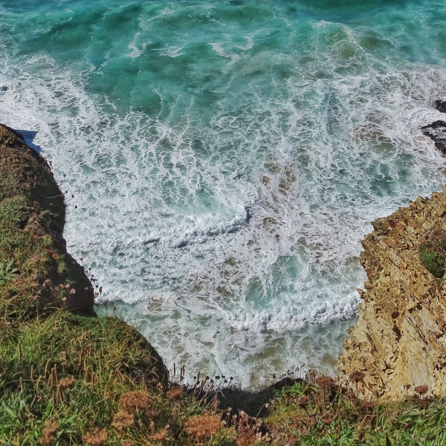 Waves by cliffs