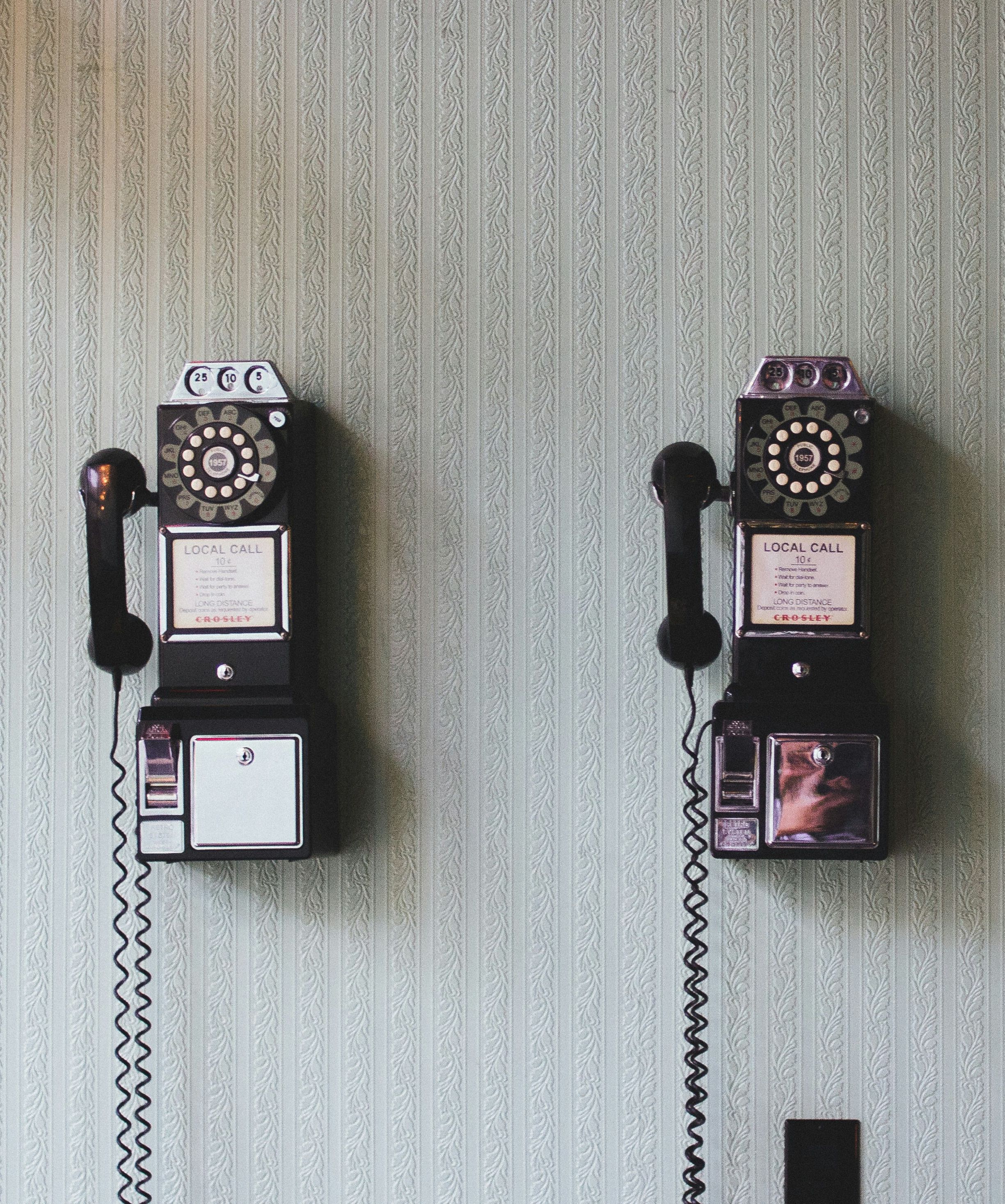 Vintage telephones on wall