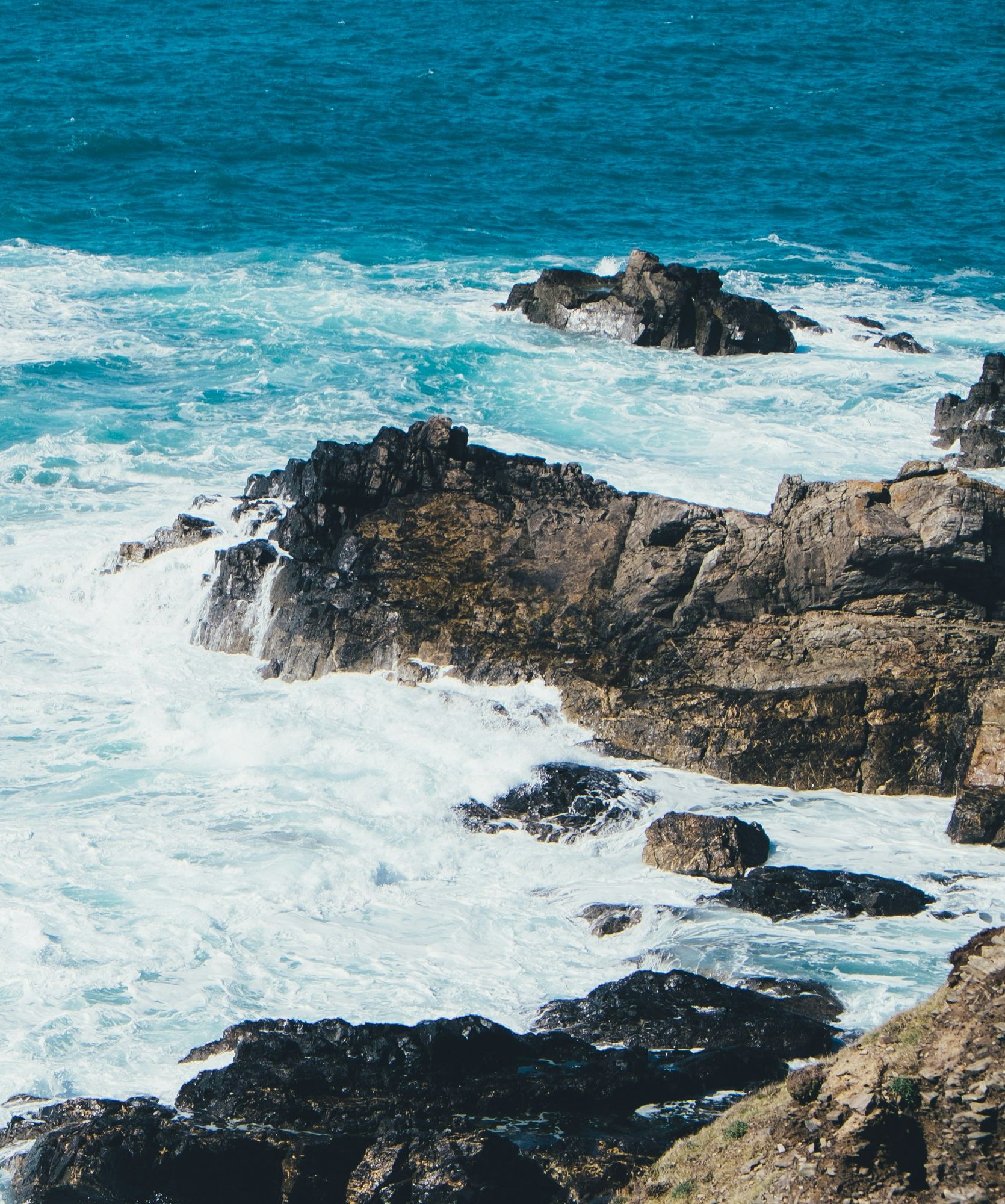 Waves crashing into rocks